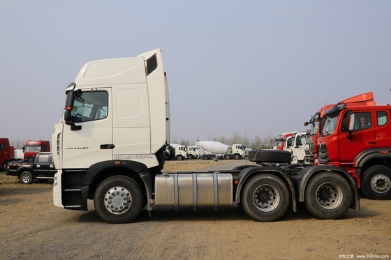 7100x2496x3958mm Boutique HOWO HOWO T7H 6*4 Camión tractor con ventana manual