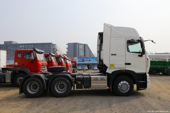7100x2496x3958mm Boutique HOWO HOWO T7H 6*4 Camión tractor con ventana manual