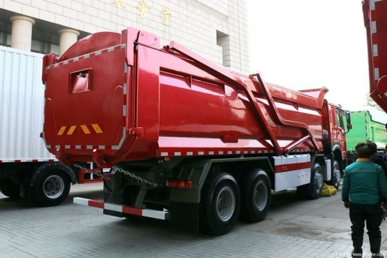 Popular segunda mano SINOTRUCK HOWO camión pesado 440 HP 8X4 camión de basura 7.6m