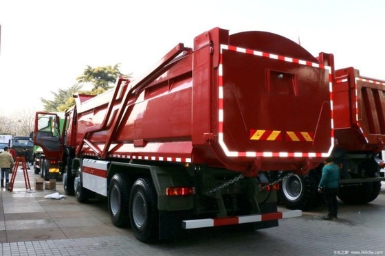 Popular segunda mano SINOTRUCK HOWO camión pesado 440 HP 8X4 camión de basura 7.6m