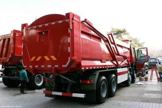 Popular segunda mano SINOTRUCK HOWO camión pesado 440 HP 8X4 camión de basura 7.6m