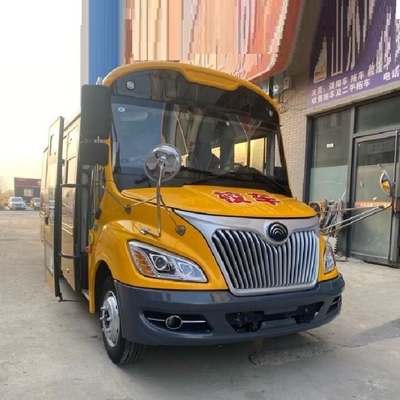 Transporte ideal de los estudiantes de primaria Autobús escolar usado con transmisión manual