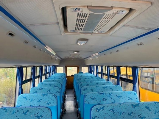 Transporte ideal de los estudiantes de primaria Autobús escolar usado con transmisión manual